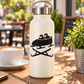 White bottle with black bobsled emblem vinyl decal: two sledders on sled