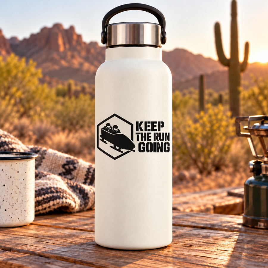 Vinyl decal on white bottle with bobsled icon and 'Keep the run going' text
