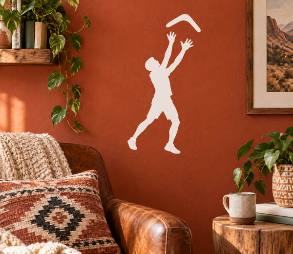 White boomerang catch vinyl decal silhouette of a person catching a boomerang