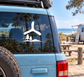 White boomerang pine flight vinyl decal on car window glass