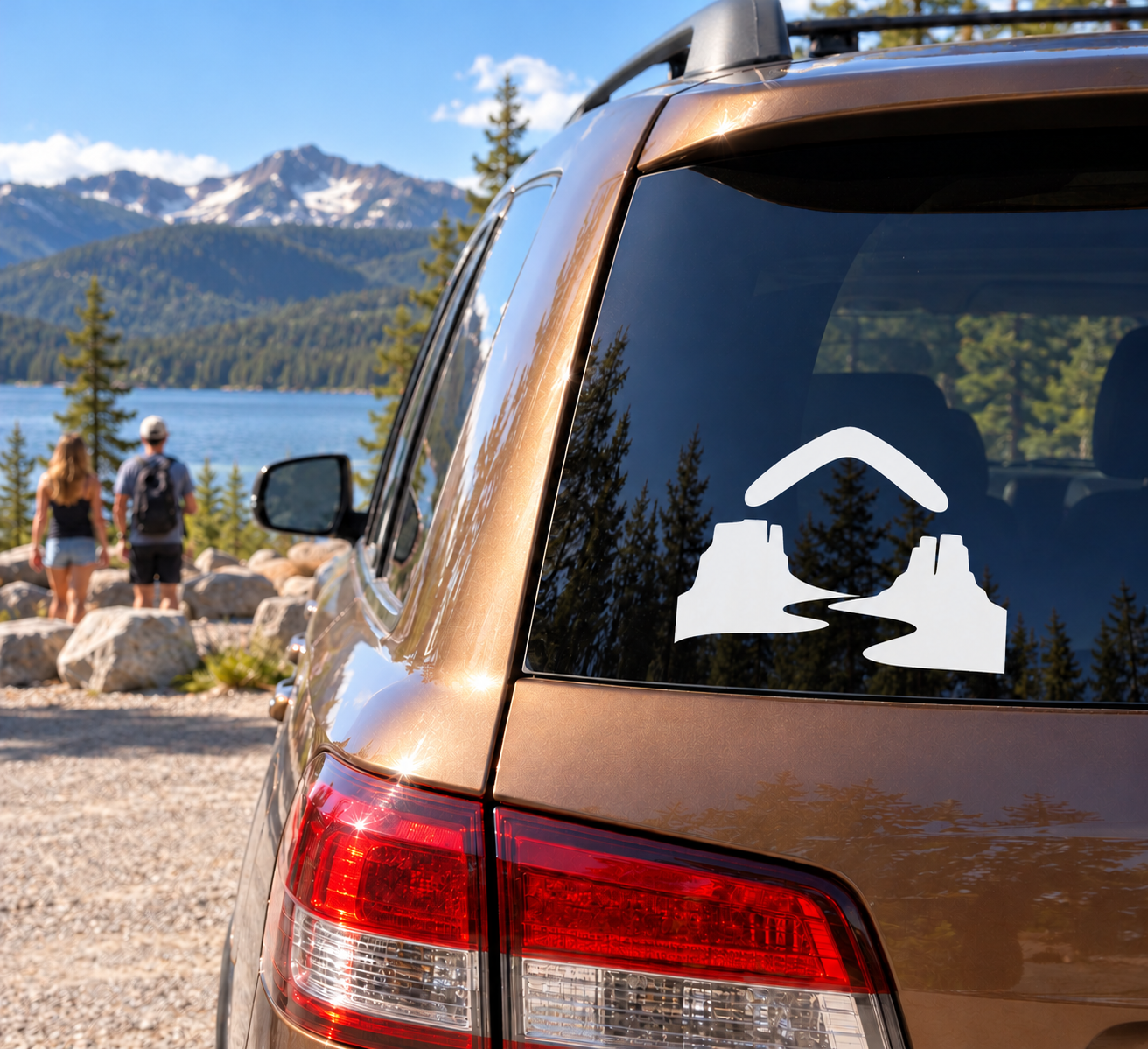 White boomerang return vinyl decal for car rear window with terrain and swoosh
