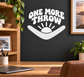 Vinyl wall decal: "One More Throw" text with wave icon, white on dark surface