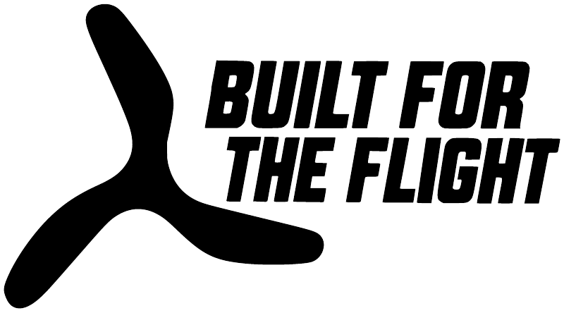 Black boomerang-shaped vinyl decal with "BUILT FOR THE FLIGHT" lettering