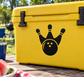Vinyl decal with black bowling pin crown and ball graphic on yellow surface