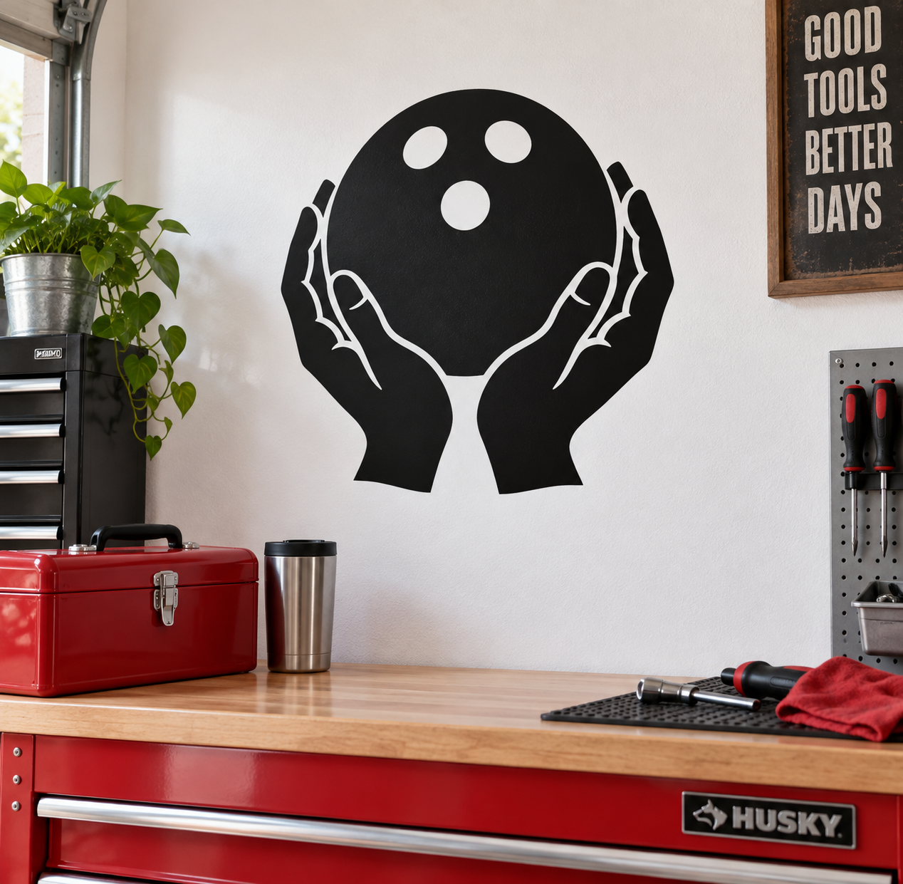 Two hands holding a bowling ball vinyl decal, black silhouette