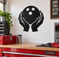 Two hands holding a bowling ball vinyl decal, black silhouette