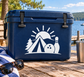 White vinyl decal on blue cooler: mountain, pine trees, bowling pin, and sunburst