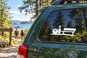 Bowling bench vinyl decal with bowling ball, pin, and seated figure silhouette on car window