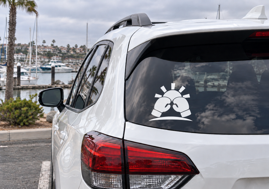 White boxing gloves graphic vinyl decal on car rear window