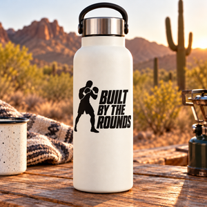 White bottle with black boxing decal: fighter silhouette and Built by the Rounds