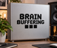 Brain Buffering vinyl decal with pixel-style text on a computer front