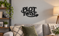 Vinyl wall decal: bold black 'PLOT TWIST' text with right arrow