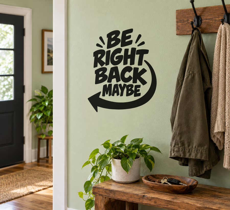 Black vinyl wall decal reading 'BE RIGHT BACK MAYBE' with arrow design
