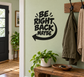 Black vinyl wall decal reading 'BE RIGHT BACK MAYBE' with arrow design