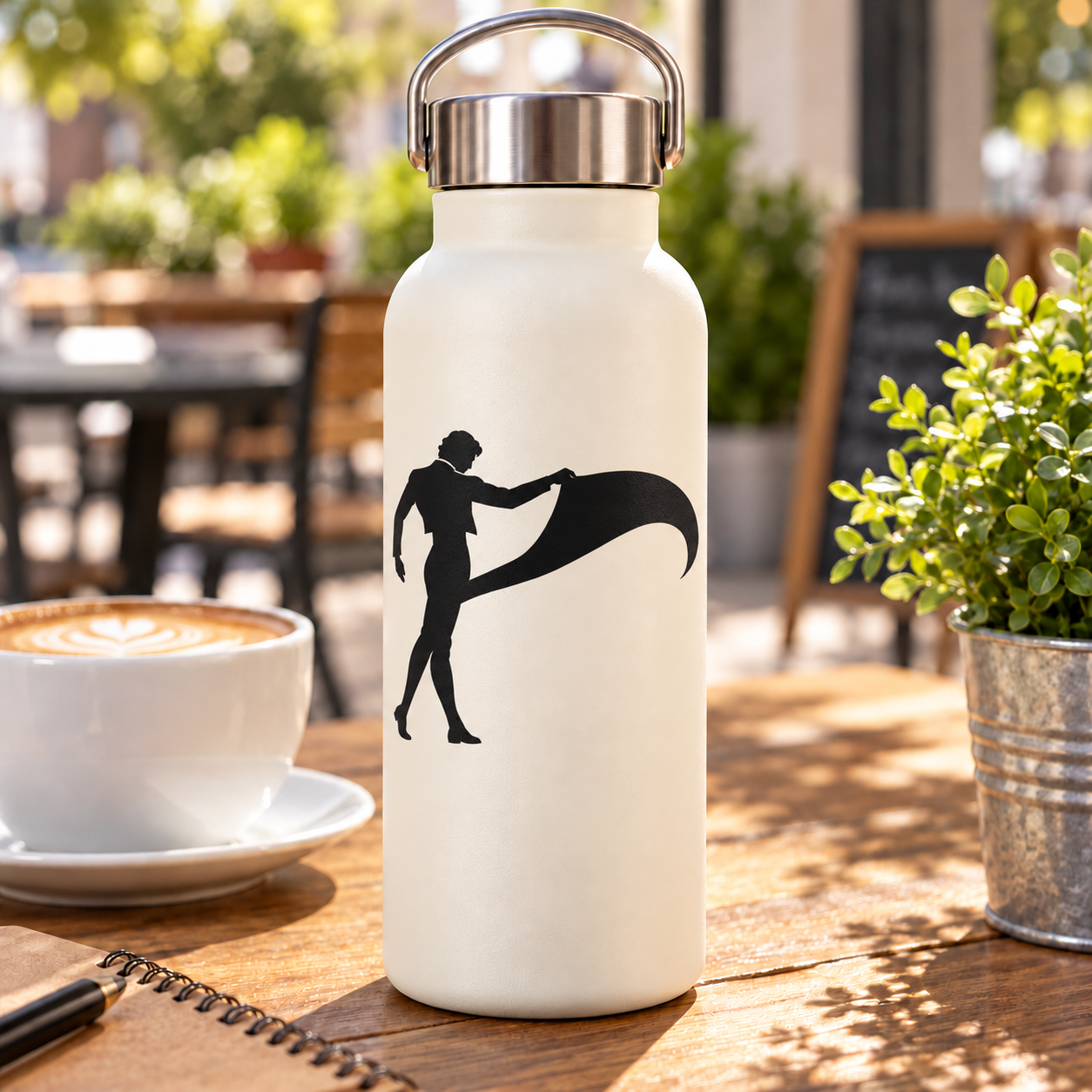 White water bottle with black bullfighter turning cape vinyl decal on front