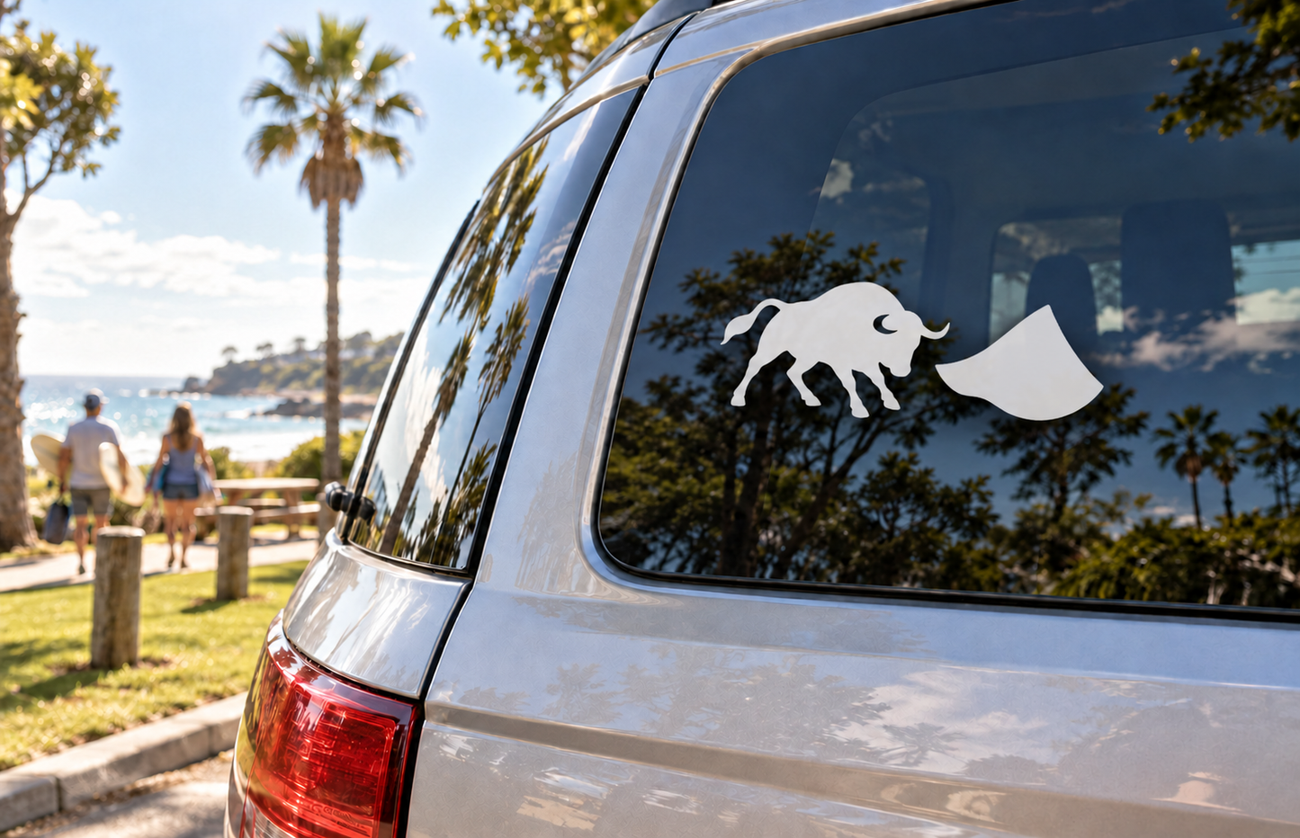 Bull and cape vinyl decal on car rear window, black design
