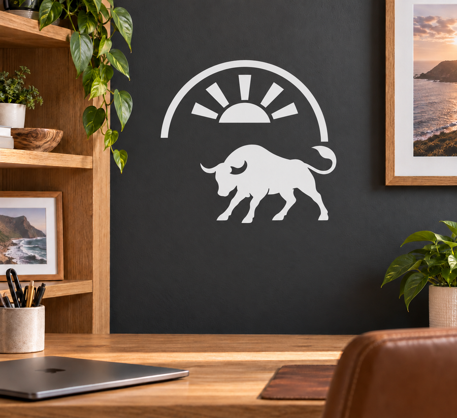 Bull sunrise vinyl decal: arched sun rays and bull silhouette, white on dark surface