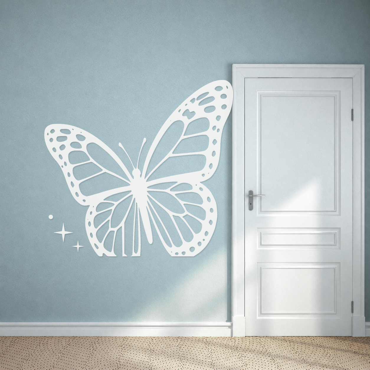 Mirrored butterfly wall decal with dotted wing borders and spark trail accents