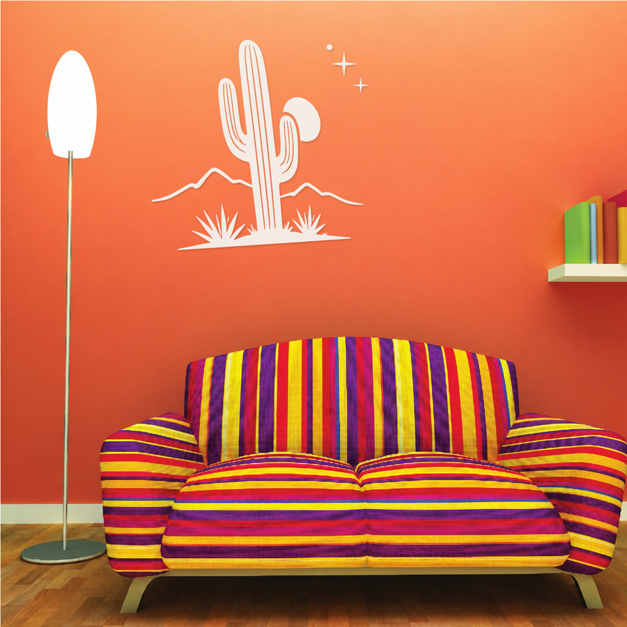 Desert cactus wall decal with moon and star sparkles, shown on a living room wall