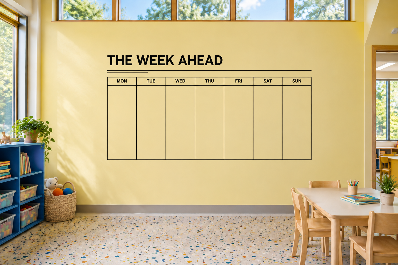 Vinyl wall decal calendar titled THE WEEK AHEAD with blank Mon–Sun boxes