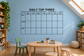 Vinyl wall decal calendar with "DAILY TOP THREE" header and Mon–Sun grid