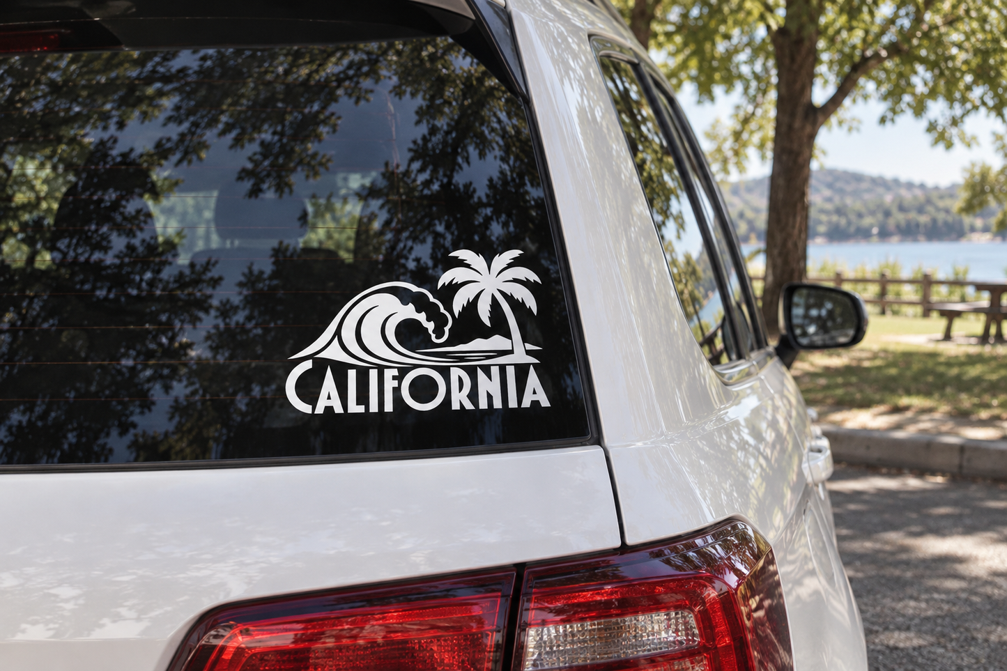 California palm wave vinyl decal with bold CALIFORNIA text on car window