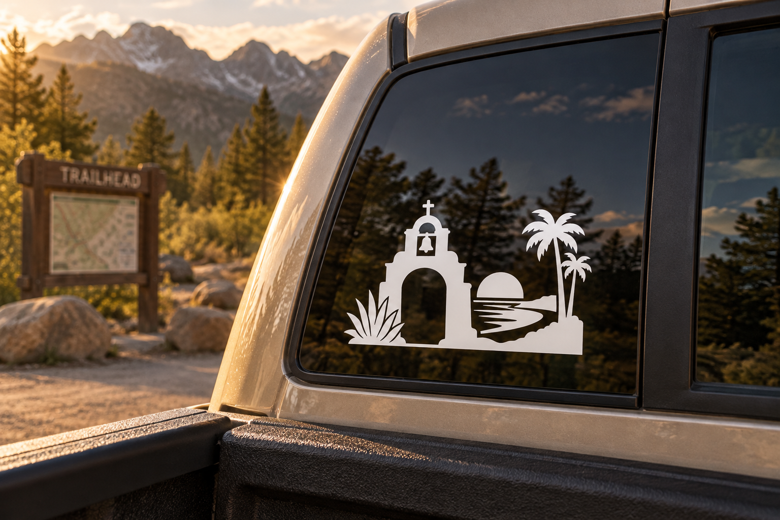 Black-and-white mission arch vinyl decal with bell tower, palm trees, and ocean silhouette