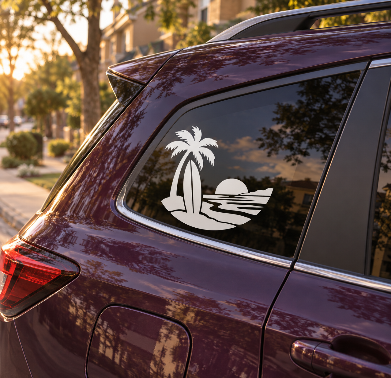 Surfboard vinyl decal on car window: black palm tree, surfboard, ocean waves