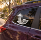 Surfboard vinyl decal on car window: black palm tree, surfboard, ocean waves