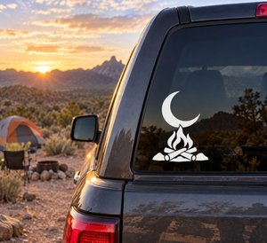 Crescent moon and campfire vinyl decal on car rear window