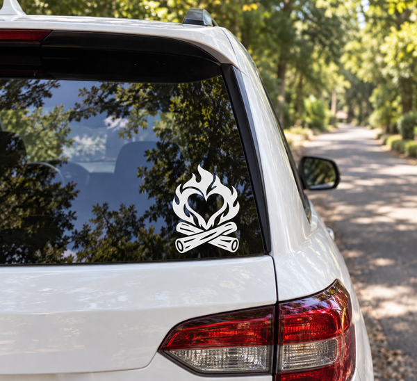 Heart-shaped fire vinyl decal with black flames and crossed logs, black and white