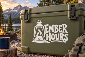 Lantern-and-campfire vinyl decal with EMBER HOURS text on dark green cooler