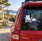 White vinyl decal of reclining camp chair with sun and beach umbrella on car window