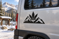 Black cannabis leaf and mountain vinyl decal on car door panel