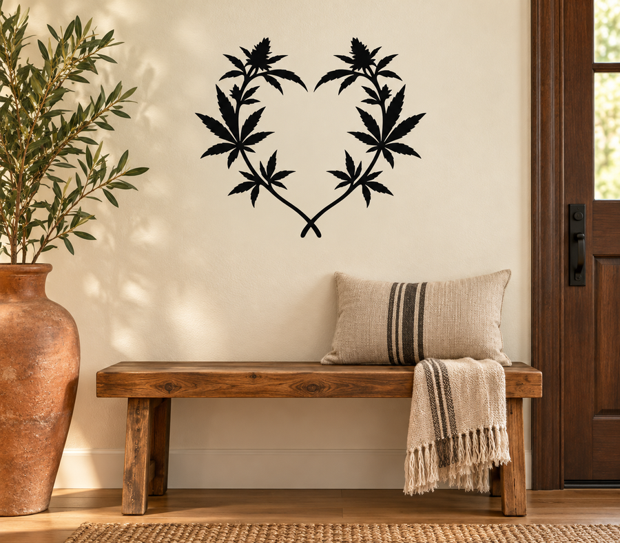 Heart-shaped cannabis leaf vinyl decal, black leaves on light background