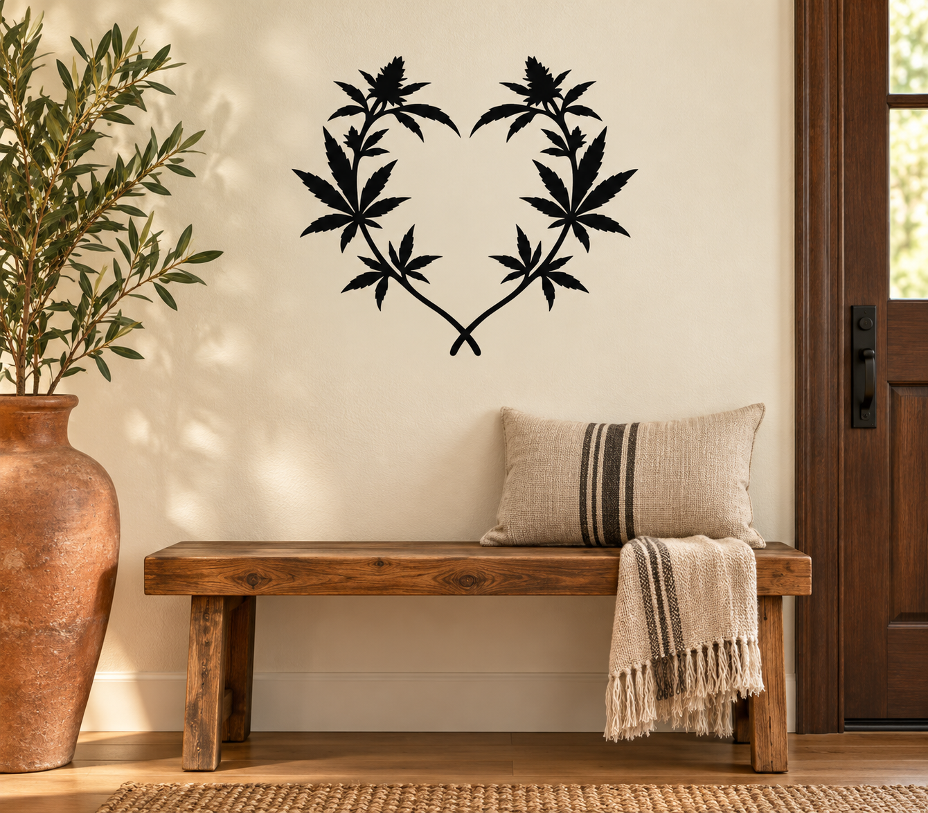 Heart-shaped cannabis leaf vinyl decal, black leaves on light background