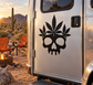 Black cannabis skull vinyl decal on a metal door panel