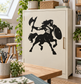 Black centaur warrior vinyl decal on cabinet door with spear and shield
