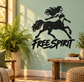 Black centaur and rider vinyl decal with “FREE SPIRIT” text on wall