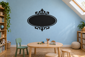 Vintage oval chalkboard vinyl decal with ornate scrolling frame, matte black center
