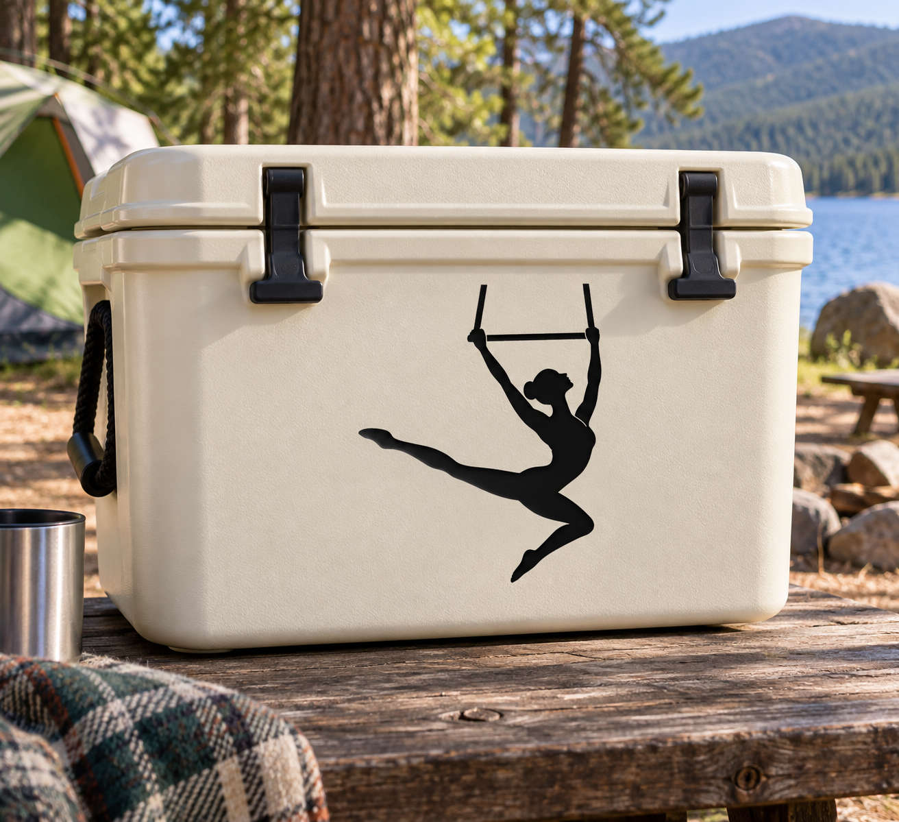 Trapeze artist vinyl decal showing a black silhouette on a cream cooler