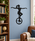 Black vinyl unicycle performer decal, full-body silhouette on unicycle
