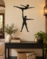 Black vinyl decal of balancing acrobat duo: one standing, one overhead balance pose