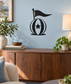 Circus ball and pennant vinyl wall decal, black globe with star and flag