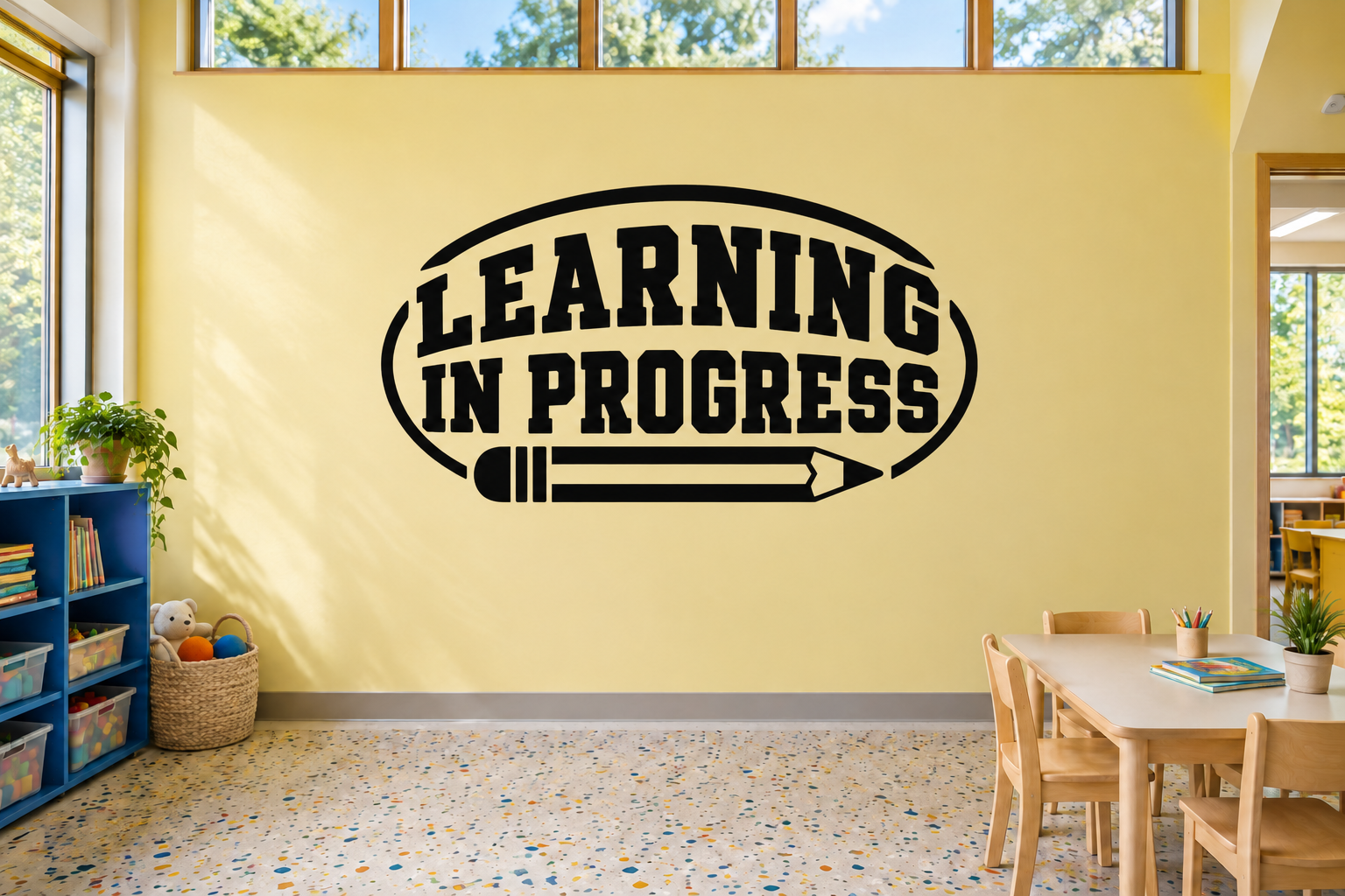 Classroom vinyl decal reading 'LEARNING IN PROGRESS' with pencil icon, black lettering