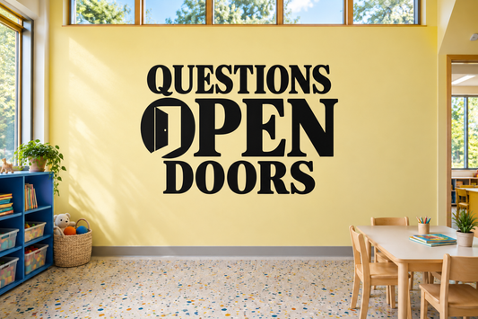 Classroom vinyl wall decal text: "QUESTIONS OPEN DOORS" in bold black letters.