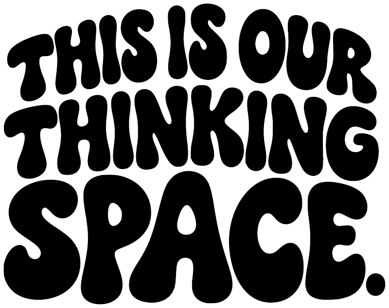 Vinyl decal letter close-up in black: “THIS IS OUR THINKING SPACE.”