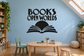 Books Open Worlds vinyl wall decal with bold text and open book graphic