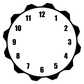 Close-up round clockface vinyl decal, white face with black numerals and jagged black edge