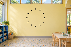 Clockface vinyl decal with black square hour markers in a circular ring